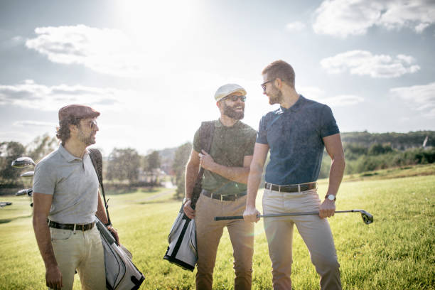 istock Golf player walking and carrying bag on course during summer game golfing 862506552