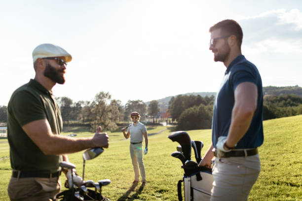istock Golf player walking and carrying bag on course during summer game golfing 862506558