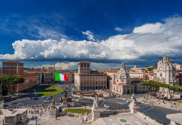 istock Piazza Venezia in Rome with Italian Flag 862535528