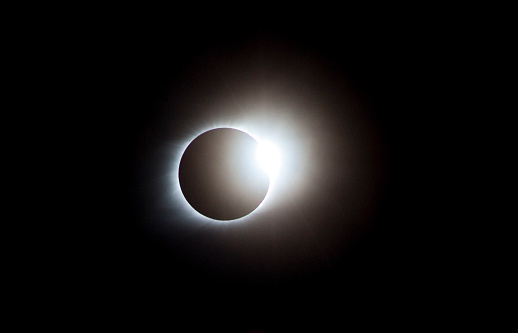 The final stage of totality, the diamond ring effect appears as the moon makes second contact on the other side of the sun.