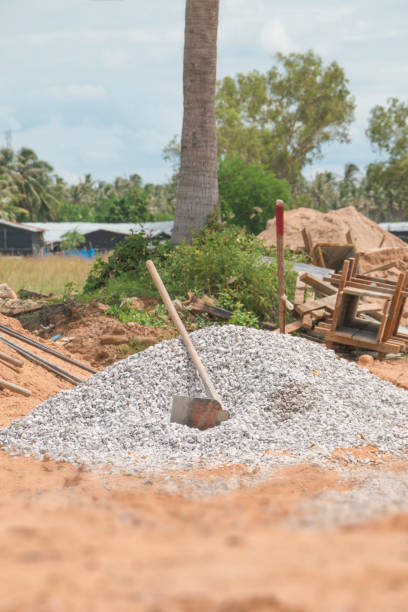istock The hoe on pile small stones for construction 862541416