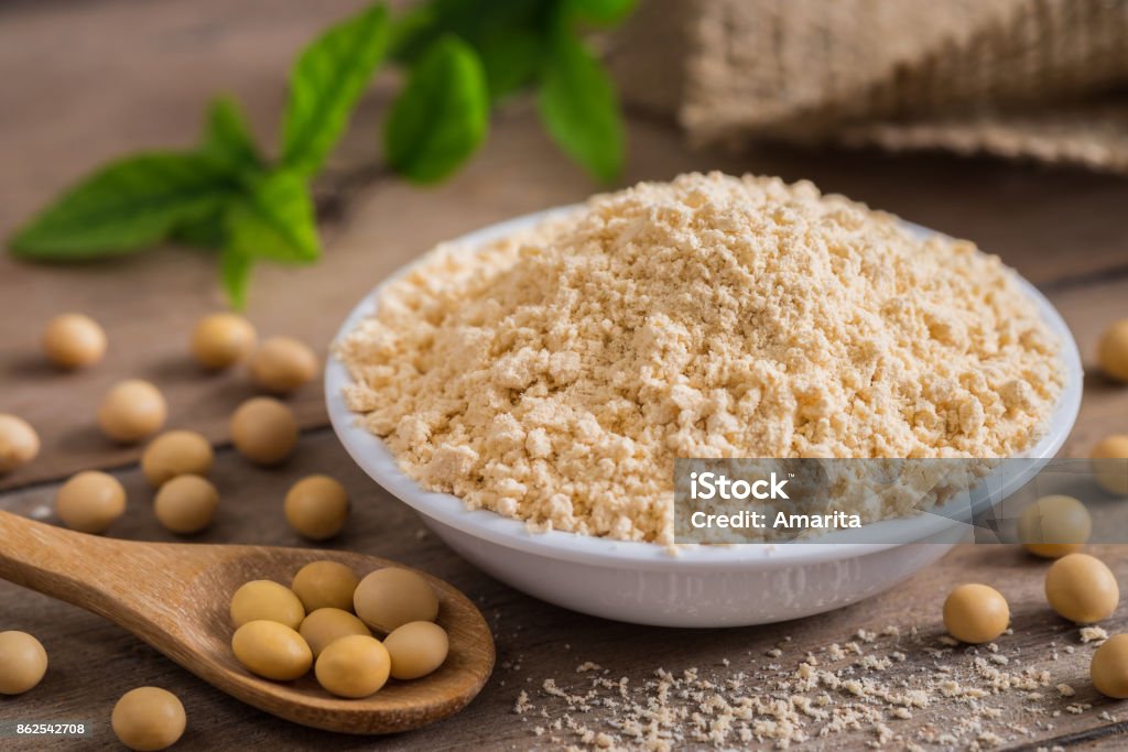 Soy flour in bowl and soybean Protein Stock Photo