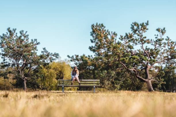 istock Girl on a bench at Vanier Park in Vancouver, Canada 862545228