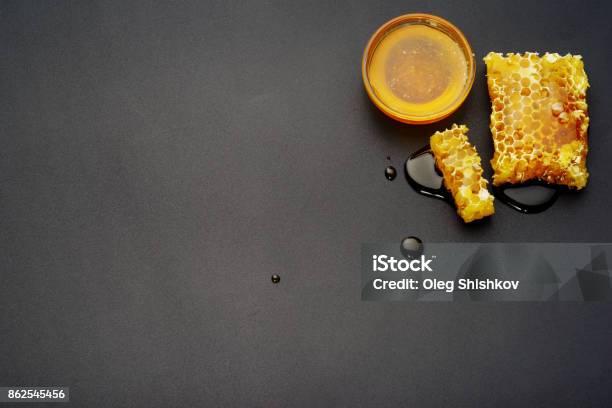 Honeycombs On A Black Background Stock Photo - Download Image Now - Beehive, Beekeeper, Beeswax