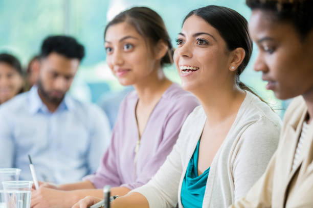 istock Female business student enjoys classroom lecture 862545732