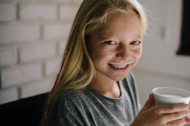 istock Girl with yogurt mustache 862546544
