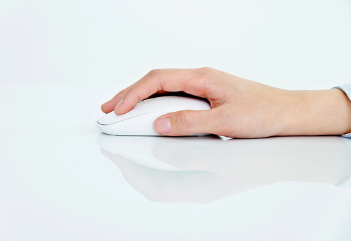 Woman hand using a mouse