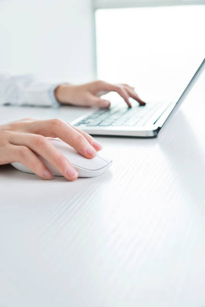 istock Businesswoman hands on a mouse and keyboard 862552072