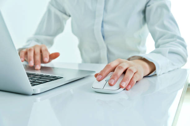istock Businesswoman hands on a mouse and keyboard 862552142