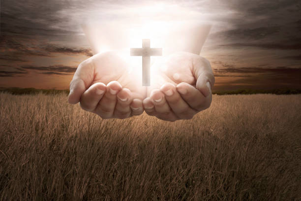istock Human hand hold christian cross 862557818