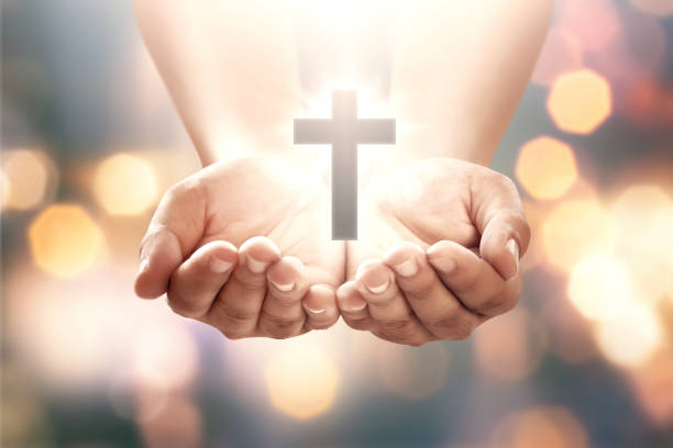 istock Human hand with shape cross in open palm 862560334