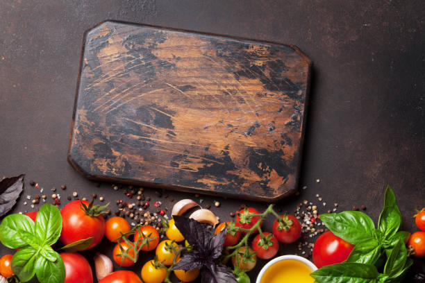 istock Tomatoes, basil, olive oil and spices 862560362