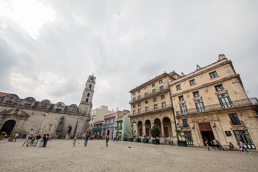 Basilica, Built Structure, Capital Cities, Church, Cityscape. Tourists on the square, the church on the left side.