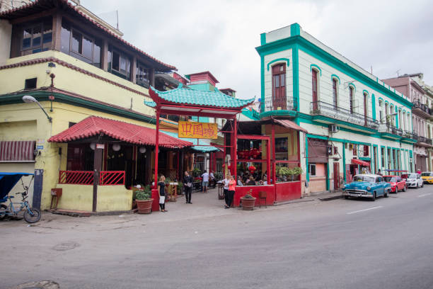 Chinese, cubans and tourists at one of the entrances to Havana's China Town.
