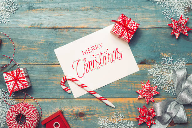 istock Christmas background with decorations on wooden background. Top view with copy space 862567402