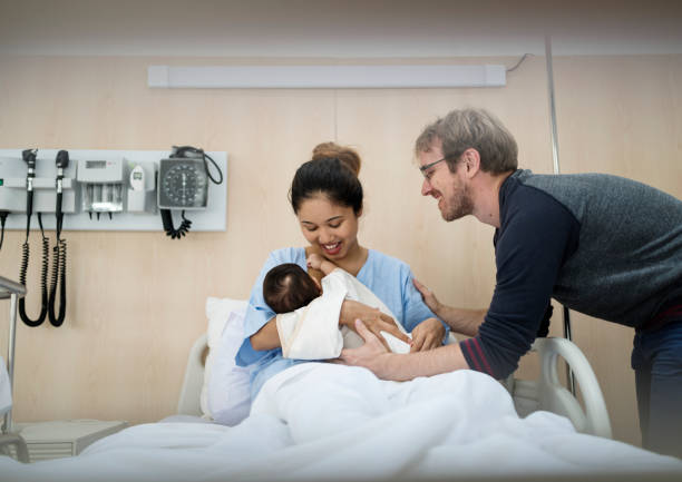 istock A newborn baby with family 862567704