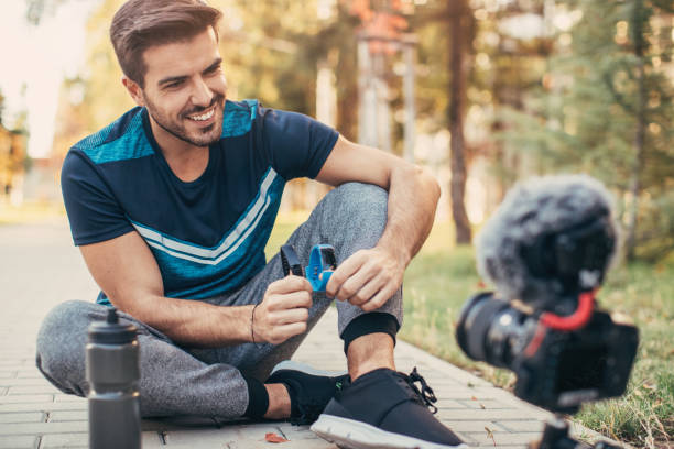 Sportsman doing a vlog about smart watches