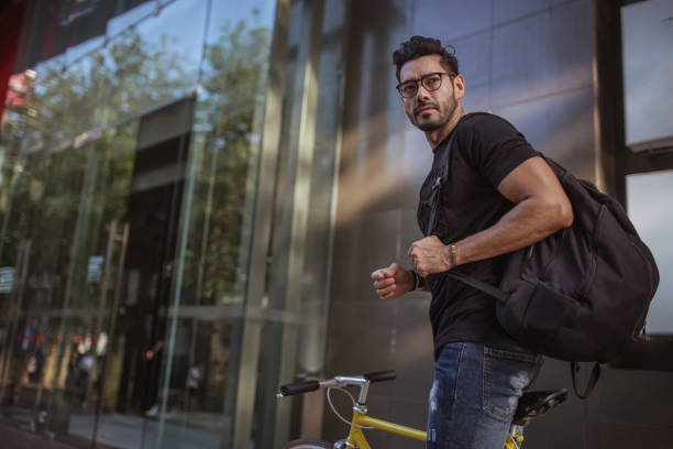 istock Man riding bicycle in city 862571442