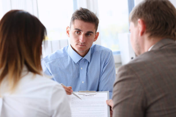 istock Businessman in blue shirt offer contract form on clipboard pad 862574900