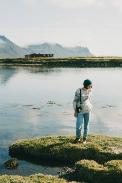 istock Woman  walking on the beach in Iceland 862579740