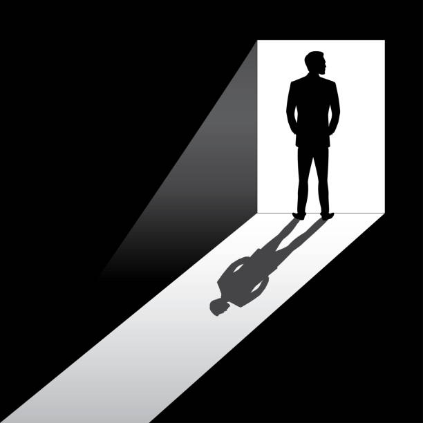 istock Silhouette of business man entering dark room with bright light 862582594