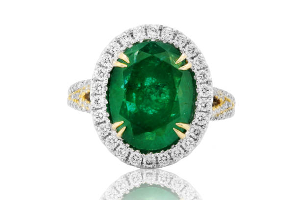 istock emerald ring with diamond in gold , classic jewelry band with gemstone 862582820