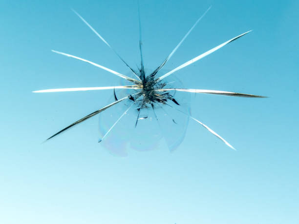 istock Small Rock Chip in Windshield of Car Close-up from Inside 862583082