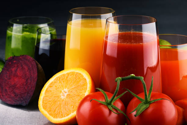 istock Glasses with fresh organic vegetable and fruit juices 862590712