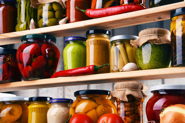 istock Jars with variety of pickled vegetables. 862593736