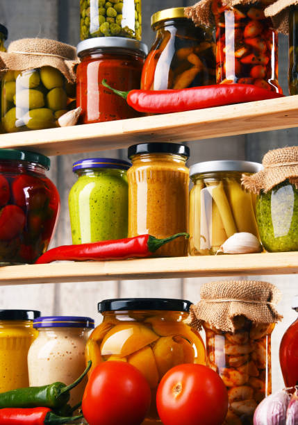 istock Jars with variety of pickled vegetables. 862593814