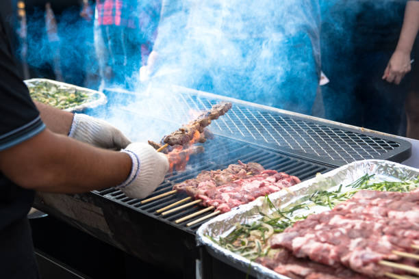 Grilled meat at street food market stock photo