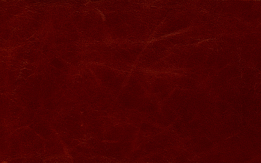 Natural red leather texture. Natural pattern. Genuine red leather background.