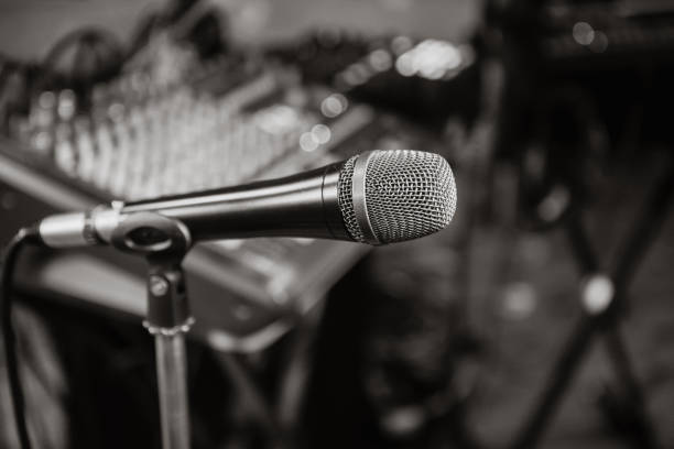 istock Microphone. Black and white photo. Microphone on stage. Microphone close-up. 862604978