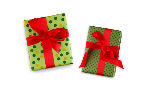 istock Gift box wrapped in green paper and red ribbon 862609174