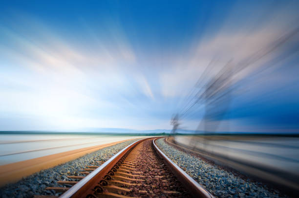 istock Motion on railroad bridge curve track over the lake, Blue Sky 862612110