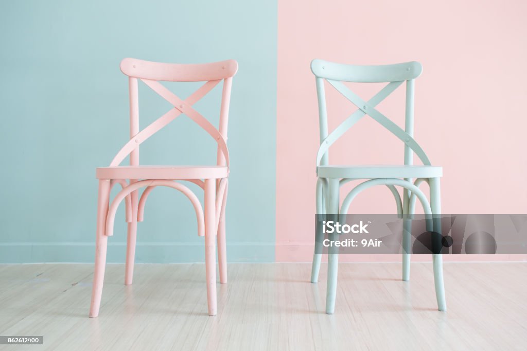 Vintage wooden chair Painted Two Tone Vintage wooden chair Painted Two Tone on Two Tone background Chair Stock Photo