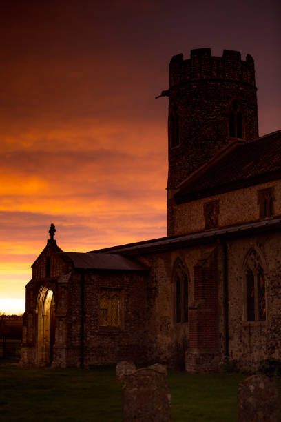 istock Church with Sahara Red Sunset, Norfolk,England,uk 862615998