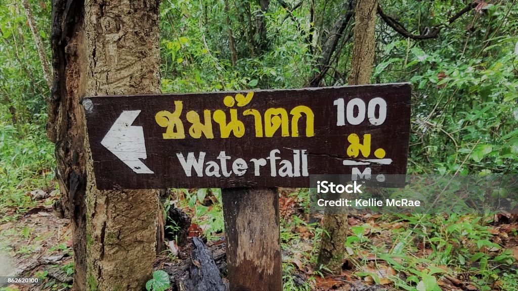 Submission Date: 2017-10-17 waterfall sign thai sign, sign in the forrest, forrest Directional Sign Stock Photo