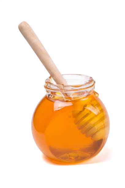 istock Jar Of Honey With Honey Dipper 862621072