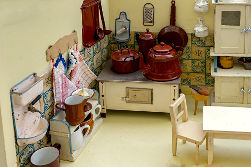 Grandmother's Old Dolls Kitchen with accessories. Toys for girls from the 40s or 50s.