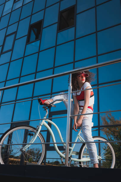 istock stylish woman with bicycle 862624904