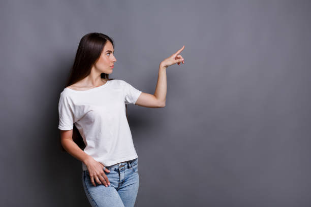 istock Cheerful girl in casual clothes posing at studio 862625786