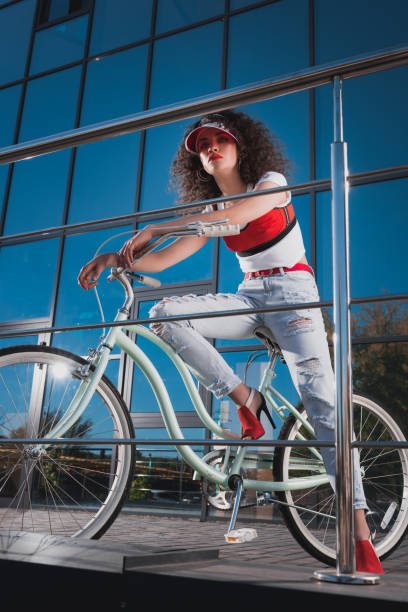 istock stylish woman with bicycle 862625796