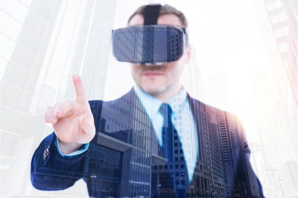 istock Pleasant businessman wearing virtual reality glasses 862626218