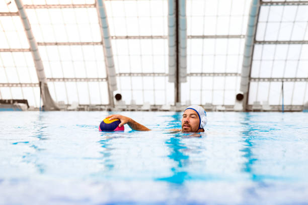 istock Water polo player in a swimming pool. 862633490