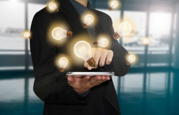 istock Business hand press tablet with light bulb, concept of new ideas with innovation and creativity. 862634482