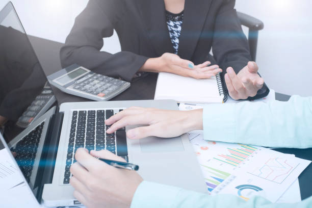 istock business accountant with document graph financial on office table. concept planning budget and audit. 862634494