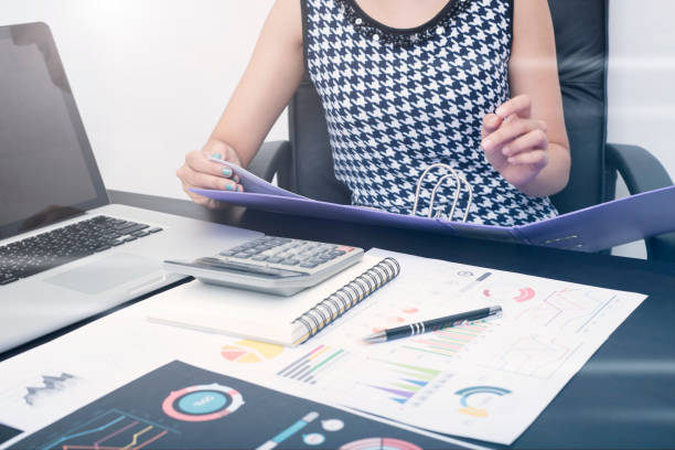 istock business accountant with document graph financial on office table. concept planning budget and audit. 862634618