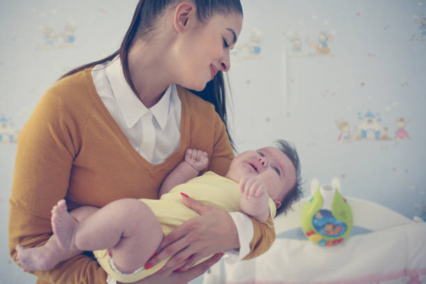 istock Mother holding baby and preparing on sleeping. 862642130