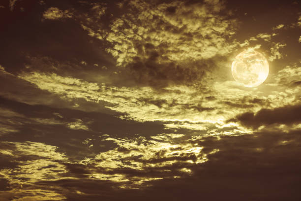 istock Beautiful night sky with dark cloudy. Some clouds overshadow the full moon. 862642908